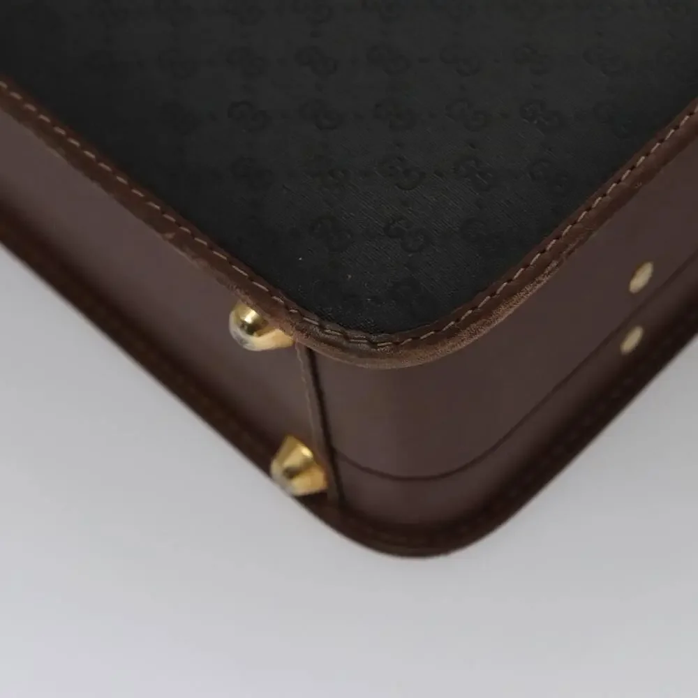 GUCCI Micro GG Canvas Trunk Black Gold